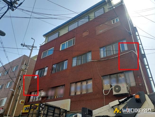 간판 철거 후 깔끔해진 건물 외관